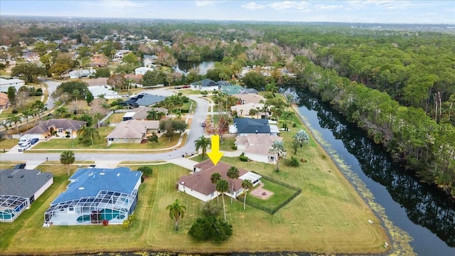 drone / aerial view with a water view