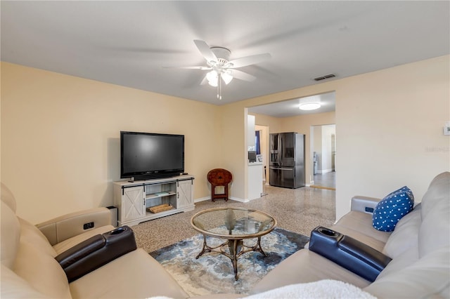 living room with ceiling fan