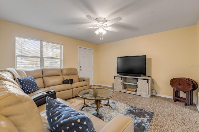 living room with light carpet and ceiling fan