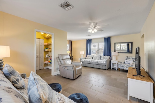 living room with ceiling fan