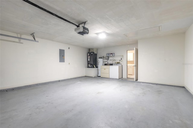 garage featuring a garage door opener, electric panel, water heater, and washer and dryer