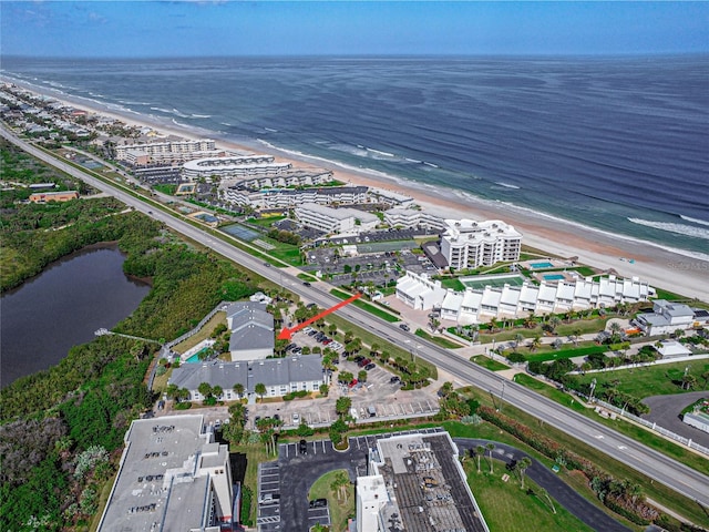 aerial view featuring a beach view and a water view