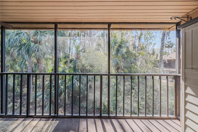 unfurnished sunroom with a wealth of natural light