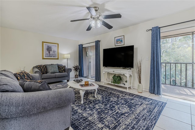 tiled living room with ceiling fan