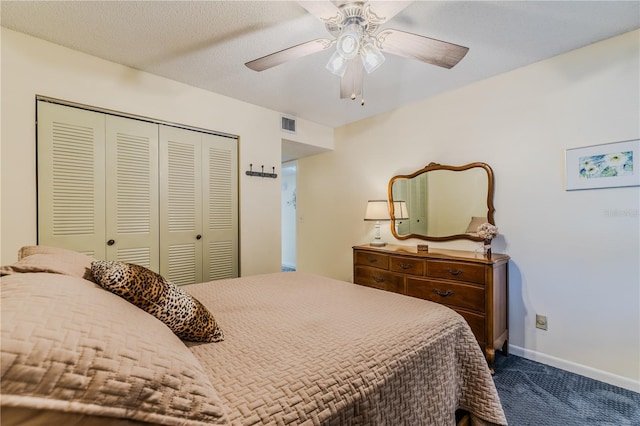 bedroom featuring a closet, ceiling fan, and carpet