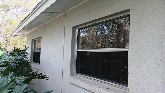 exterior details with stucco siding