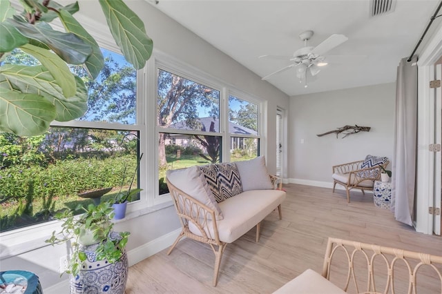 interior space with light hardwood / wood-style flooring and ceiling fan