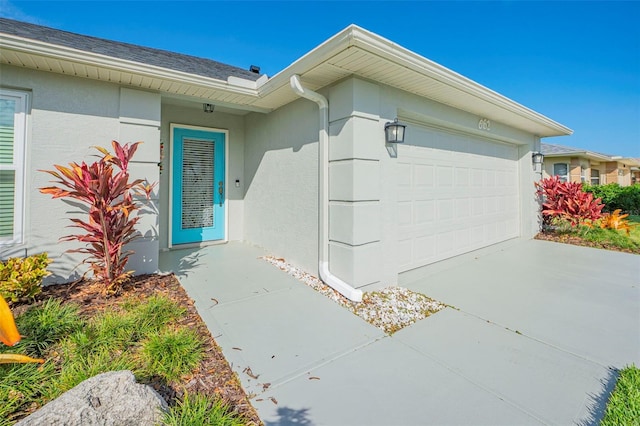 entrance to property featuring a garage