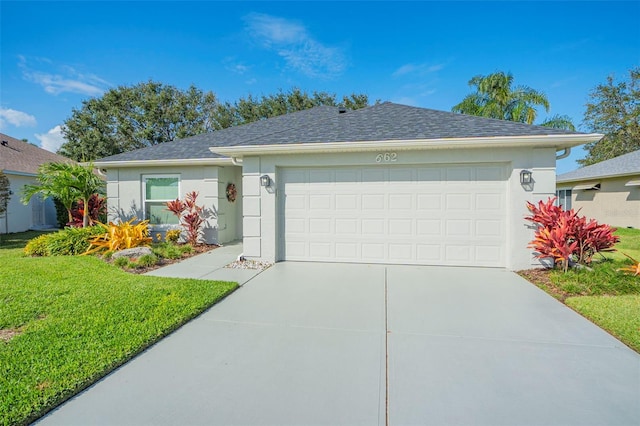 single story home featuring an attached garage, driveway, a shingled roof, and stucco siding