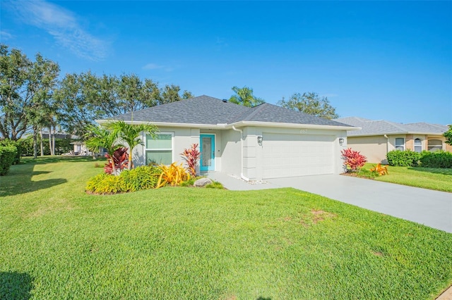 ranch-style home with a garage and a front lawn