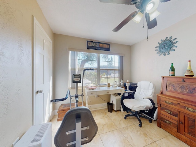 exercise area with ceiling fan