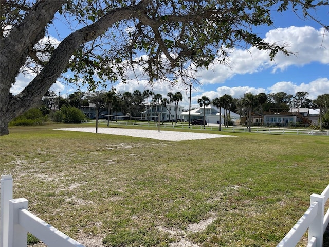 view of yard featuring volleyball court