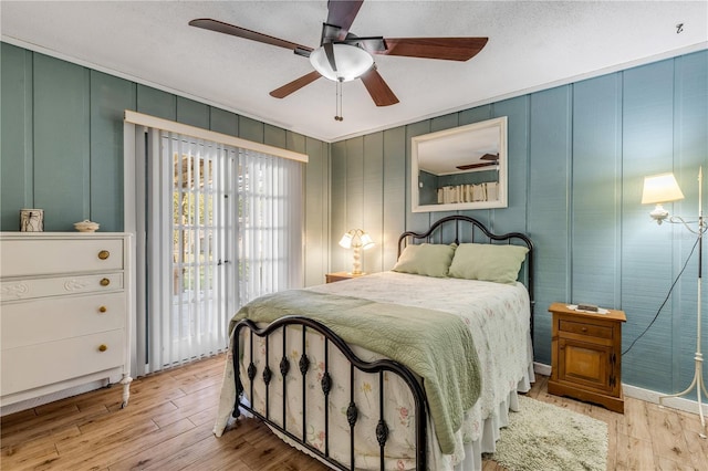 bedroom featuring ceiling fan and light wood-type flooring