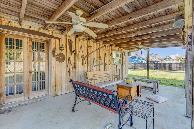 view of patio with french doors and ceiling fan