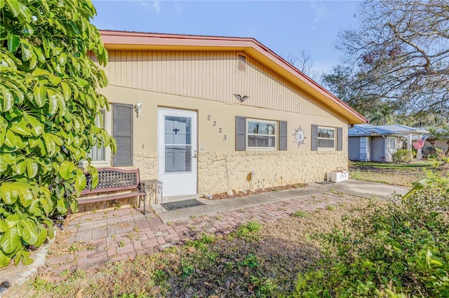 view of front of home with a patio area