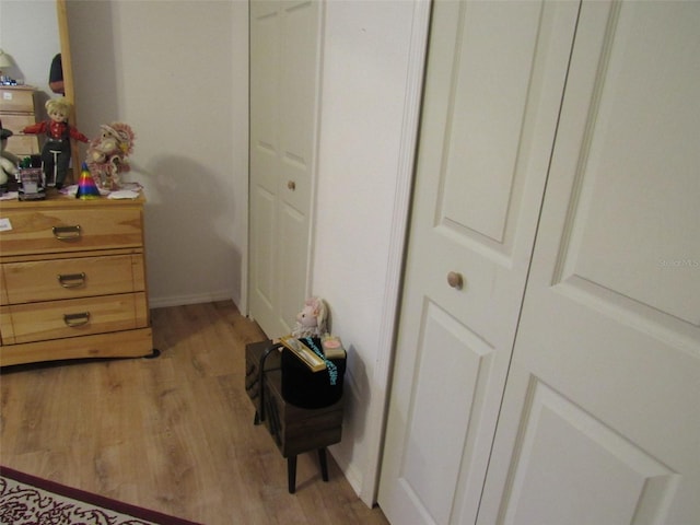 bedroom with light hardwood / wood-style flooring