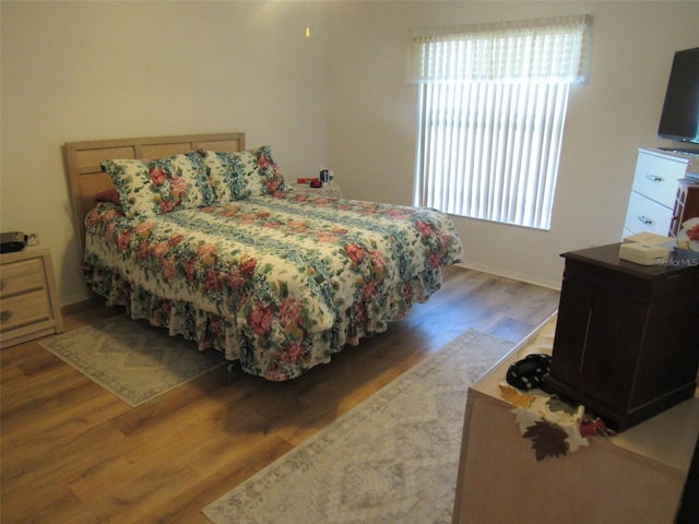 bedroom featuring hardwood / wood-style floors