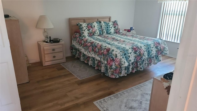 bedroom featuring hardwood / wood-style flooring