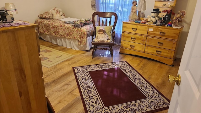 bedroom featuring light hardwood / wood-style floors