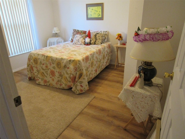 bedroom featuring light wood-type flooring