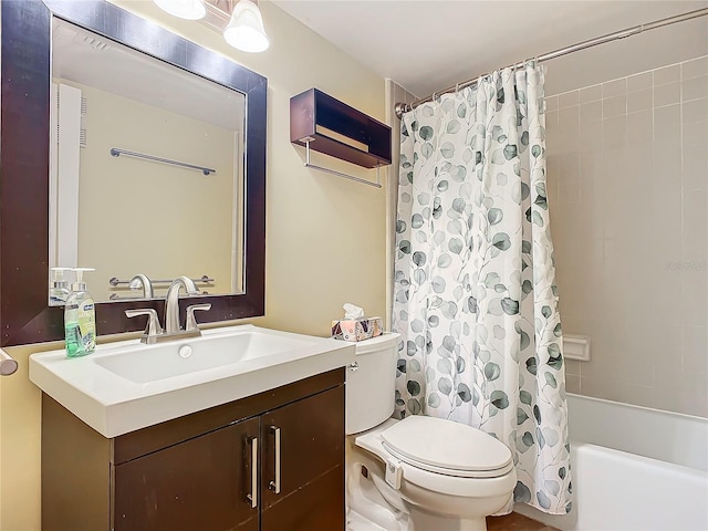 full bathroom featuring shower / tub combo, vanity, and toilet