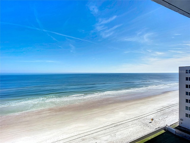 view of water feature with a beach view