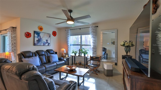 tiled living room with ceiling fan