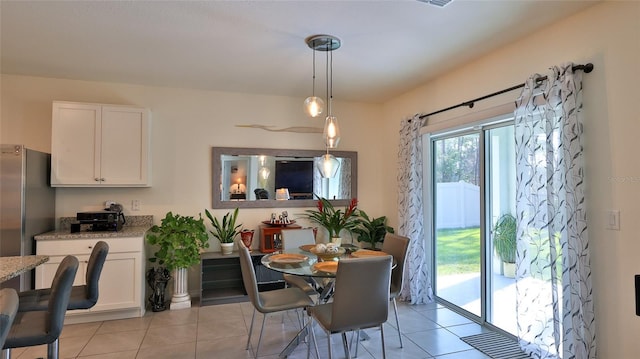 view of tiled dining area