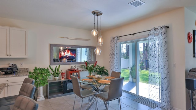 view of tiled dining space