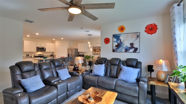 living room featuring ceiling fan