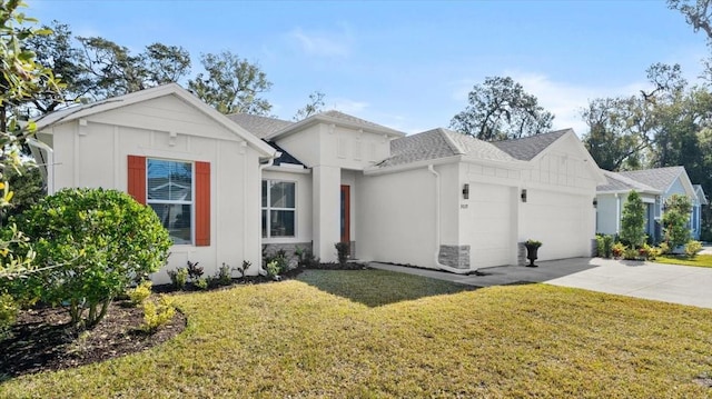 view of front of property with a garage and a front yard