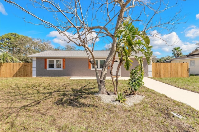 view of front of property with a front lawn