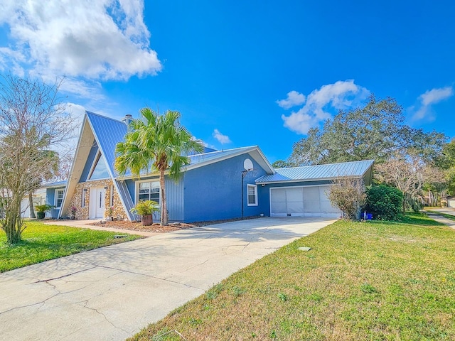 ranch-style home with a garage and a front yard