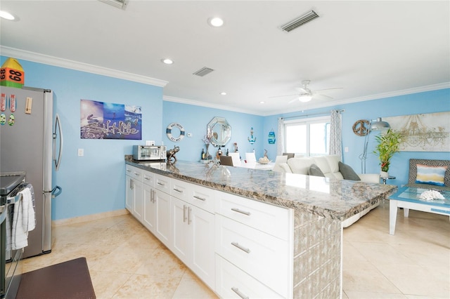 kitchen featuring white cabinetry, ornamental molding, light stone countertops, and stainless steel appliances