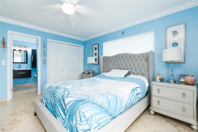 bedroom with ornamental molding, ceiling fan, and a closet