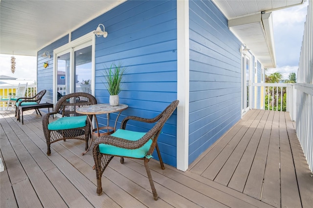 wooden deck featuring a porch