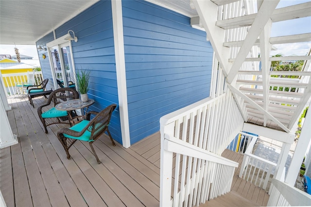 wooden terrace with covered porch