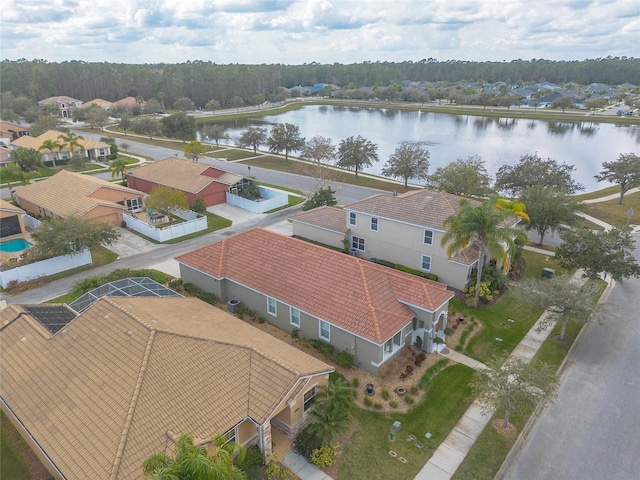 drone / aerial view with a water view