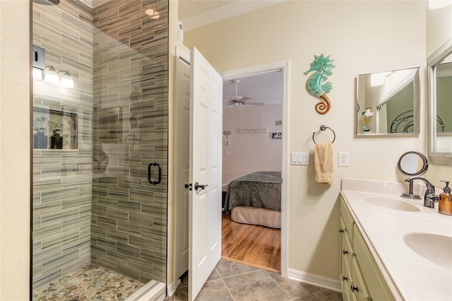 bathroom featuring ceiling fan, tile patterned floors, vanity, and a shower with shower door