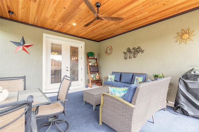 view of patio with a grill, outdoor lounge area, french doors, and ceiling fan