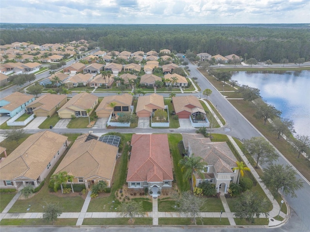 drone / aerial view featuring a water view