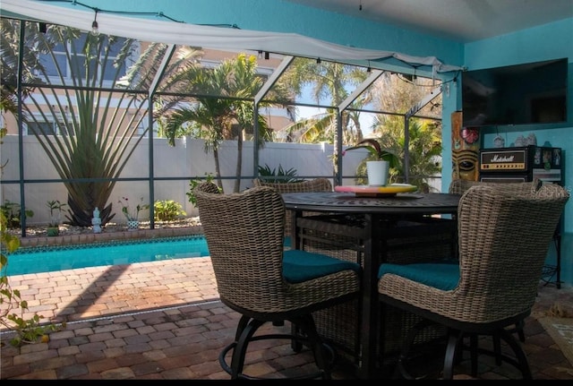 view of patio / terrace featuring a lanai and a fenced in pool