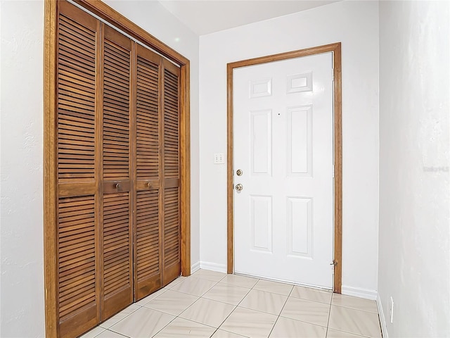 interior space featuring light tile patterned floors