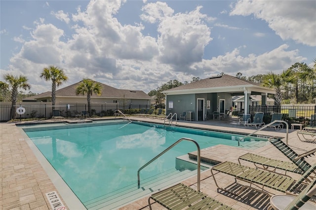 view of swimming pool featuring a patio area