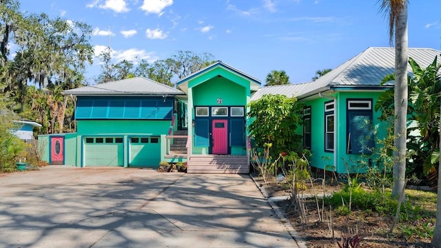 view of front of home with a garage