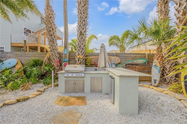 view of patio with area for grilling and grilling area