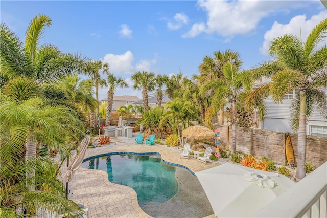 view of swimming pool featuring a patio area