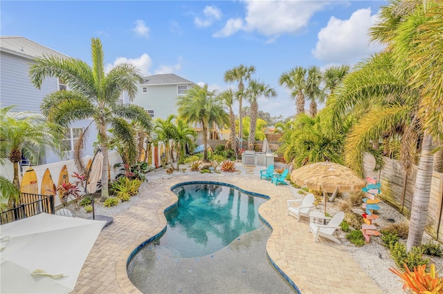 view of pool featuring a patio