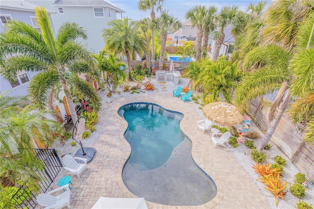 view of swimming pool with a patio area