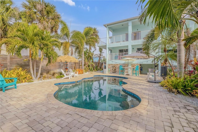 view of pool featuring a patio